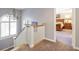 Bright staircase leading to the upper level, with view into bedroom at 2190 Stephen Long Ne Dr, Atlanta, GA 30305
