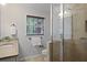 Beautiful bathroom featuring a glass-enclosed shower, granite countertops, and neutral tones at 225 River Springs Dr, Sandy Springs, GA 30328