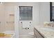Well lit bathroom with a large mirror, granite countertops, and a shower/bath at 225 River Springs Dr, Sandy Springs, GA 30328