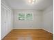 Bedroom with natural light, hardwood floors and closet space at 225 River Springs Dr, Sandy Springs, GA 30328