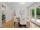 Cozy breakfast nook near the doorway, features a round table and hardwood floors for a relaxing dining atmosphere at 225 River Springs Dr, Sandy Springs, GA 30328