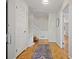 Inviting entryway featuring hardwood floors, a staircase, and neutral paint, creating a warm welcome at 225 River Springs Dr, Sandy Springs, GA 30328