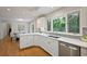 Beautiful eat-in kitchen features stainless steel appliances, granite countertops and hardwood floors at 225 River Springs Dr, Sandy Springs, GA 30328