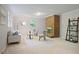 Inviting living room with neutral tones, a brick fireplace, and bright natural light at 225 River Springs Dr, Sandy Springs, GA 30328