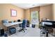 This office has a window with curtain and has lots of work space at 129 Finsbury Ln, Woodstock, GA 30188
