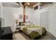 Modern bedroom with bed, linens, and closet at 19 Hilliard Se St # 13, Atlanta, GA 30312