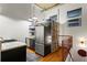 Modern kitchen with stainless steel appliances, sleek cabinetry, and a cozy breakfast bar with counter seating at 19 Hilliard Se St # 13, Atlanta, GA 30312