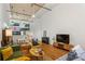 Spacious living room featuring hardwood floors, comfortable seating, a ceiling fan, and an open floor plan at 19 Hilliard Se St # 13, Atlanta, GA 30312