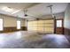 Spacious two-car garage with ample room for parking and storage; garage door opener included at 214 Jamestown Ave, Jonesboro, GA 30236