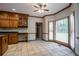 Eat-in kitchen featuring tile floors, and a large window with natural light at 214 Jamestown Ave, Jonesboro, GA 30236