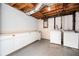 Basement featuring a washer, a dryer, and ample storage space with white cabinets at 3322 Northcrest Rd # A, Atlanta, GA 30340