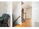 Welcoming entryway with hardwood floors, staircase, and natural light, creating an inviting transition into the home at 3322 Northcrest Rd # A, Atlanta, GA 30340