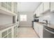 Bright kitchen with stainless steel appliances, granite countertops, and ample storage, perfect for culinary enthusiasts at 3322 Northcrest Rd # A, Atlanta, GA 30340
