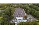 Aerial shot featuring a outdoor amphitheater nestled in the trees with a crowd of people and buildings at 905 Stovall Ne Blvd, Atlanta, GA 30319