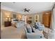 Bright bedroom with sitting area, ceiling fan, and neutral color palette at 905 Stovall Ne Blvd, Atlanta, GA 30319