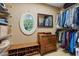 Walk-in closet with natural light, shoe storage, and hanging racks at 905 Stovall Ne Blvd, Atlanta, GA 30319