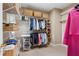 Spacious walk-in closet with shelving, racks, and organized storage at 905 Stovall Ne Blvd, Atlanta, GA 30319