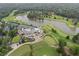 Aerial view of clubhouse with a swimming pool, tennis courts, and immaculately landscaped grounds at 905 Stovall Ne Blvd, Atlanta, GA 30319