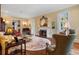 Comfortable living room with a fireplace, hardwood floors, decorative rug, and elegant furnishings at 905 Stovall Ne Blvd, Atlanta, GA 30319