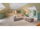 Cozy living room with comfortable seating, shelving, and natural light at 905 Stovall Ne Blvd, Atlanta, GA 30319