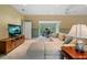 Bright living room with comfortable seating, shelving, and natural light at 905 Stovall Ne Blvd, Atlanta, GA 30319