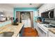 Functional kitchen with granite counters, modern appliances, and laundry hookups, combining convenience and efficiency at 1364 Keys Crossing Ne Dr, Atlanta, GA 30319