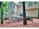 The backyard deck includes patio furniture and a grill, offering a relaxing outdoor retreat at 1850 Noblin Ridge Way, Duluth, GA 30097
