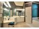 Bathroom featuring an extended vanity with ample cabinet space, a large mirror, and elegant lighting at 1850 Noblin Ridge Way, Duluth, GA 30097