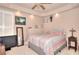 Bedroom with tray ceiling, recessed lighting, a large bed and neutral walls at 1850 Noblin Ridge Way, Duluth, GA 30097