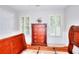 Bedroom with paneled walls, two windows, and natural light at 1850 Noblin Ridge Way, Duluth, GA 30097