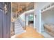 Grand foyer with staircase featuring wood and iron banisters and hardwood floors at 1850 Noblin Ridge Way, Duluth, GA 30097