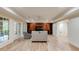 Finished basement featuring a custom built-in entertainment center and access to outdoor patio at 314 Caruso Ct, Sandy Springs, GA 30350