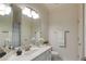 Neutral bathroom featuring a white vanity with an undermount sink and a framed mirror above at 314 Caruso Ct, Sandy Springs, GA 30350