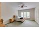 Bedroom with neutral carpet, a ceiling fan, and a twin bed with a matching wood desk at 314 Caruso Ct, Sandy Springs, GA 30350