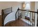 Elegant foyer featuring a staircase with wood steps and decorative iron railings at 314 Caruso Ct, Sandy Springs, GA 30350