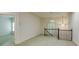 Light-filled hallway with carpet flooring and a window at 314 Caruso Ct, Sandy Springs, GA 30350