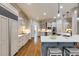 Open-concept kitchen featuring stainless steel appliances and granite countertops, perfect for entertaining at 314 Caruso Ct, Sandy Springs, GA 30350