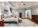 Spacious main bedroom with hardwood floors and access to en-suite bathroom at 314 Caruso Ct, Sandy Springs, GA 30350
