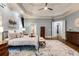 Spacious main bedroom with hardwood floors, trey ceilings, and access to ensuite bathroom at 314 Caruso Ct, Sandy Springs, GA 30350