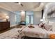 Spacious main bedroom featuring trey ceilings and modern fireplace at 314 Caruso Ct, Sandy Springs, GA 30350