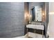 Chic powder room featuring designer wallpaper and a stylish vanity at 314 Caruso Ct, Sandy Springs, GA 30350