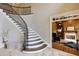 Elegant study features wood paneled walls, a cozy fireplace, built-in shelving, and large windows at 314 Caruso Ct, Sandy Springs, GA 30350