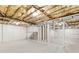 Unfinished basement with exposed ceiling and white walls at 347 Chip Rd, Stone Mountain, GA 30087