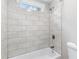 Bright bathroom with tiled shower and tub combination at 347 Chip Rd, Stone Mountain, GA 30087