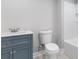 Bathroom with blue vanity and modern fixtures at 347 Chip Rd, Stone Mountain, GA 30087