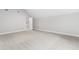 Large bedroom with vaulted ceiling, neutral walls, and gray carpet at 347 Chip Rd, Stone Mountain, GA 30087