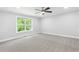 Bedroom with a window and carpeted floors at 347 Chip Rd, Stone Mountain, GA 30087