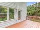 Outdoor deck with view of wooded backyard at 347 Chip Rd, Stone Mountain, GA 30087