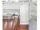 Bright entryway view with hardwood floors leading to an open-concept kitchen and living area at 347 Chip Rd, Stone Mountain, GA 30087