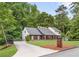 Beautiful home with a welcoming front yard, long driveway, and a charming mailbox at 347 Chip Rd, Stone Mountain, GA 30087